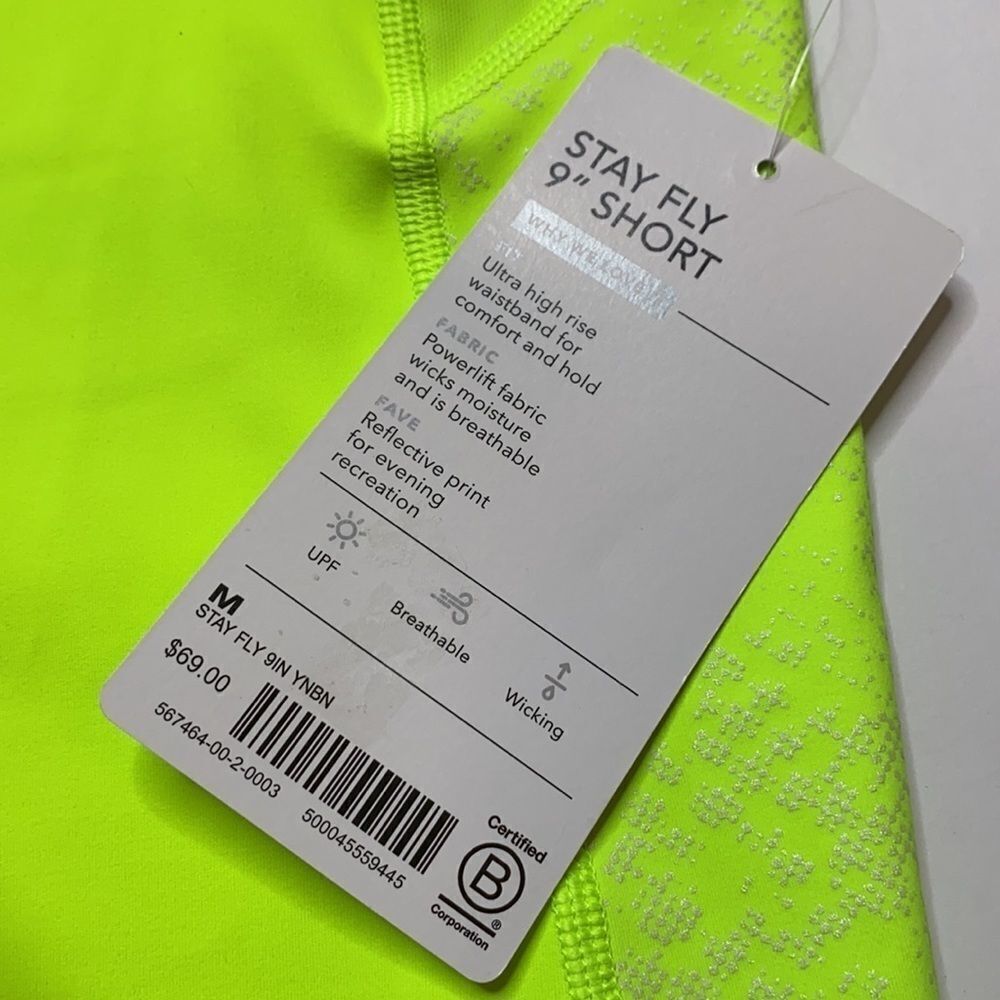 ‎Athleta Stay Fly Reflective Compression 9" Shorts - Picture 6 of 13
